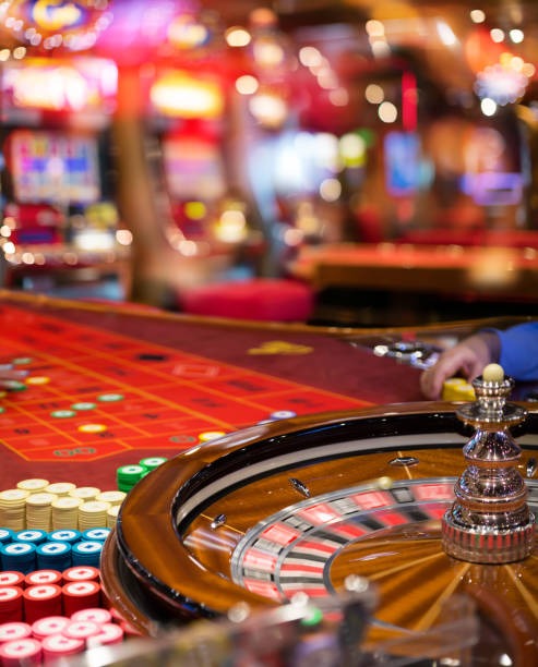 Live-dealer broadcast showing Baccarat table with multi-camera angles