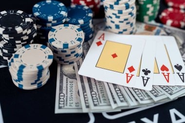 Live-dealer poker table setup with professional croupiers and multiple camera angles in a broadcast studio